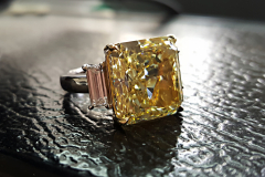 12.65 Carats Yellow Radiant Diamond with White Baguettes